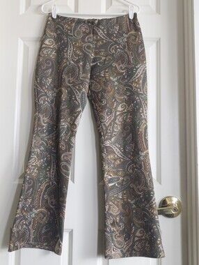 Vintage late 90s or Y2K mid rise olive green and tan paisley stretch flares
